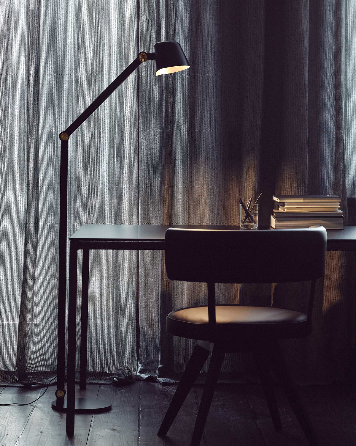 Midgard Modular NEO adjustable LED floor lamp in a contemporary interior