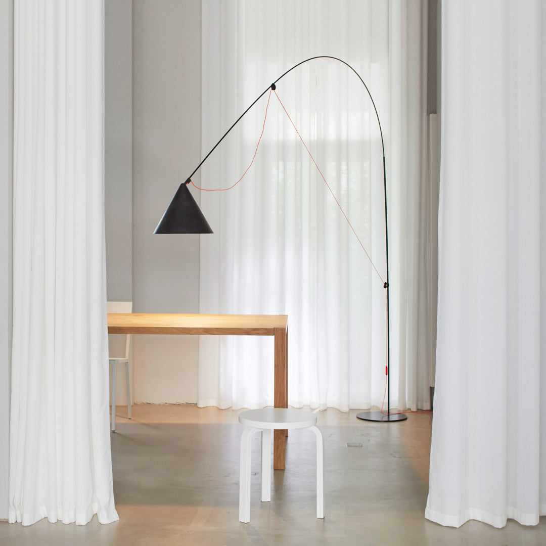 AYNO XL floor lamp for Midgard Licht by Stefan Diez lighting a dining table by e15