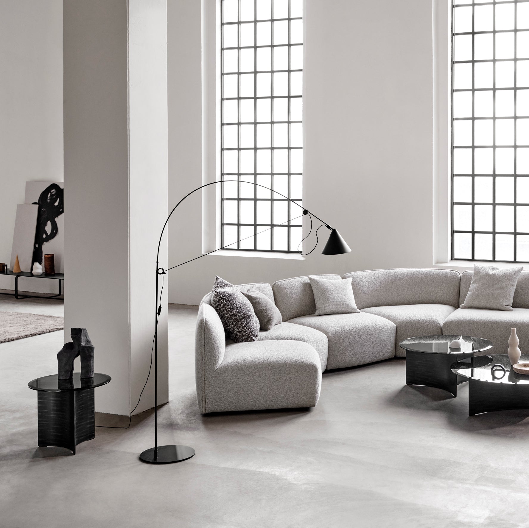 AYNO L floor lamp provides elegant black arched floor lamp with pivoting shade, ideal for focused ambient lighting