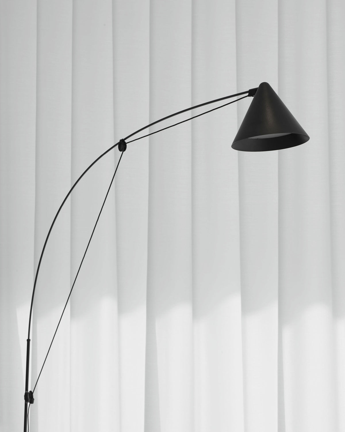 Midgard AYNO L adjustable floor lamp in black with directional lampshade