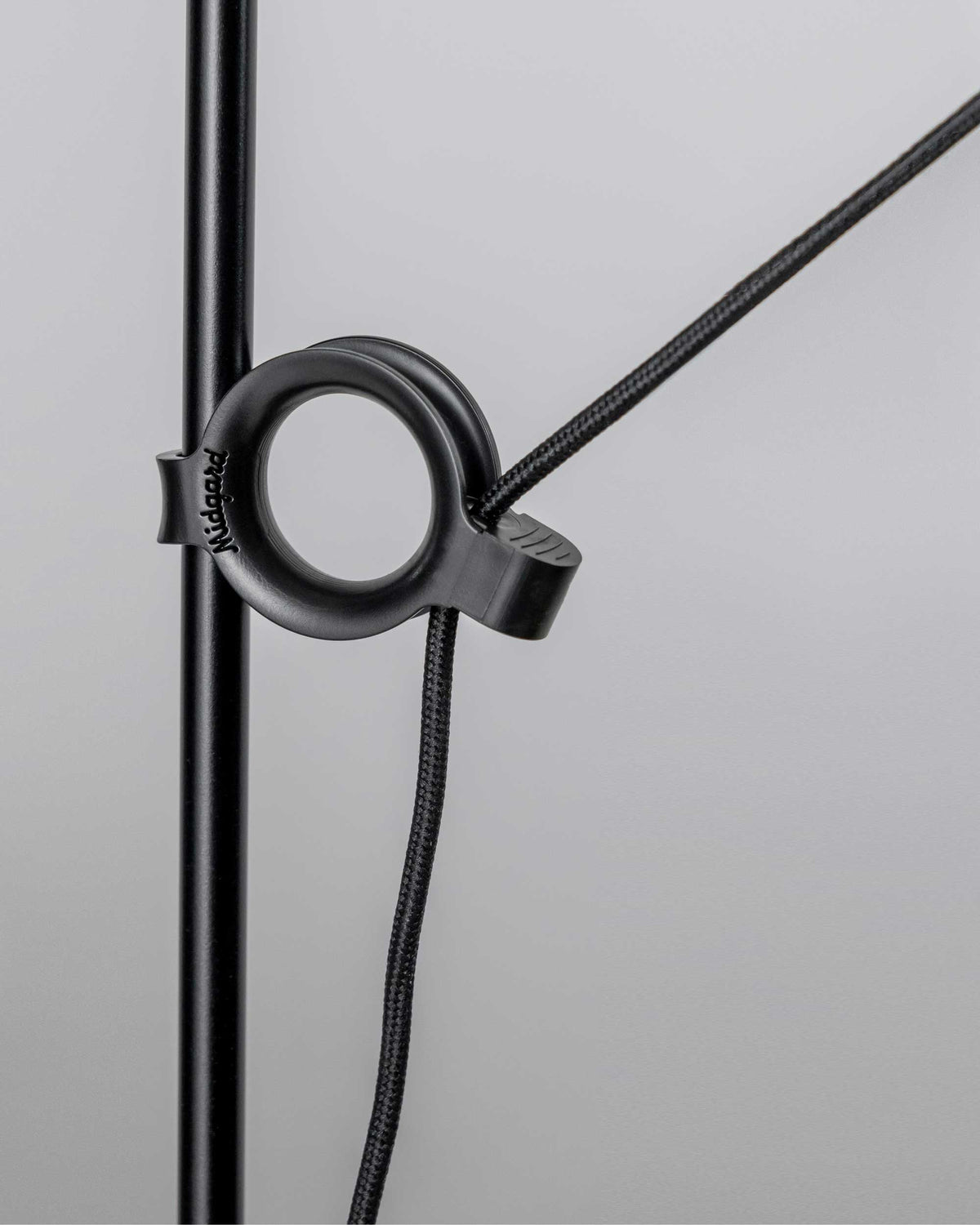 Close up of Adjustment ring and textile cable of the Midgard AYNO L floor lamp in black