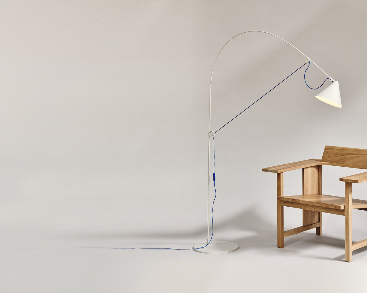 AYNO floor lamp by Stefan Diez for Midgard with flexible fiberglass rod, textile cable and intuitive adjustable lighting.
