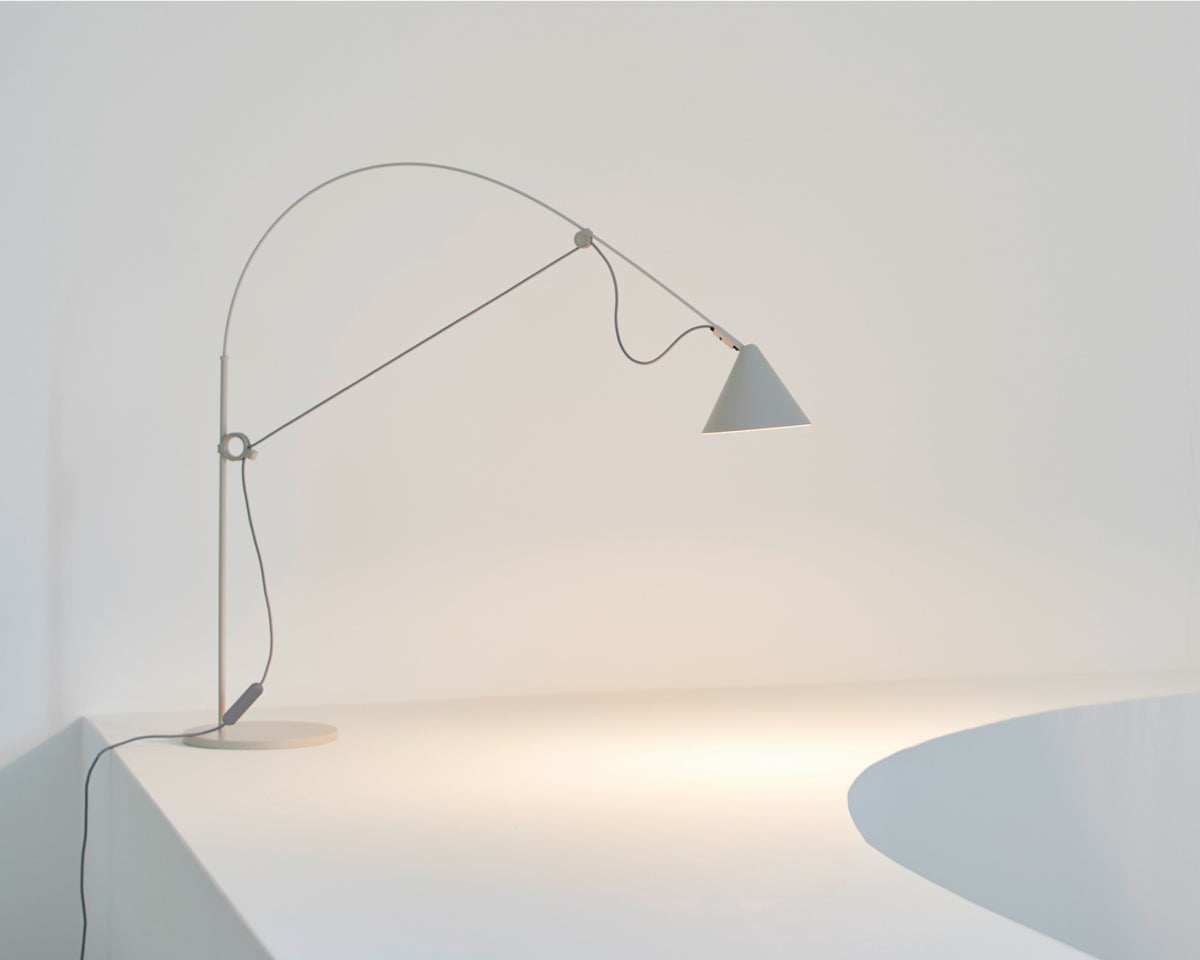 AYNO table lamp designed by Stefan Diez for Midgard, featuring the patented fiberglass rod adjustment principle for precise adjustable lighting.