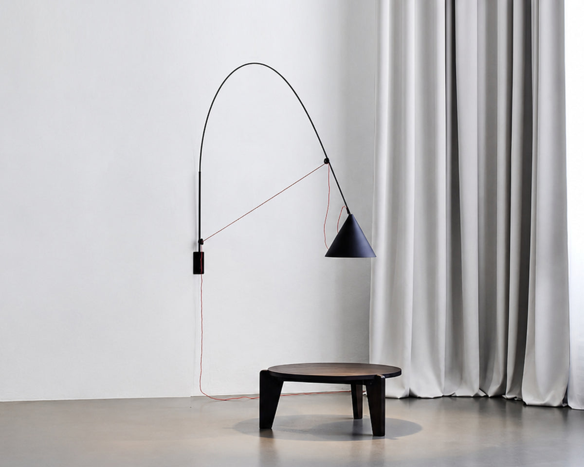AYNO XL wall lamp by Stefan Diez for Midgard with patented fiberglass rod technology for flexible wall-mounted lighting.