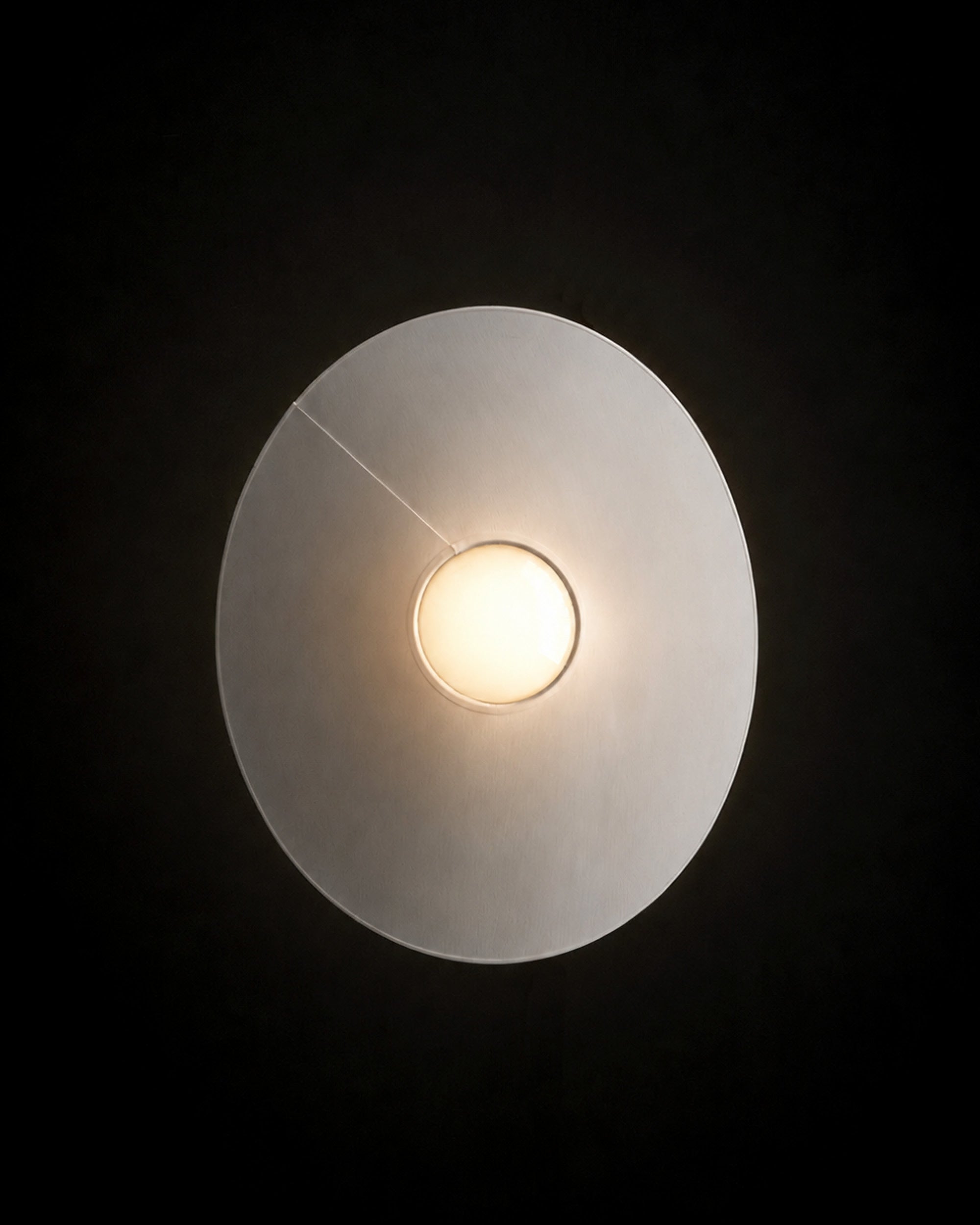 Top view of the LOJA table lamp by Sebastian Herkner for Midgard, showing its atmospheric Tunable White LED light.