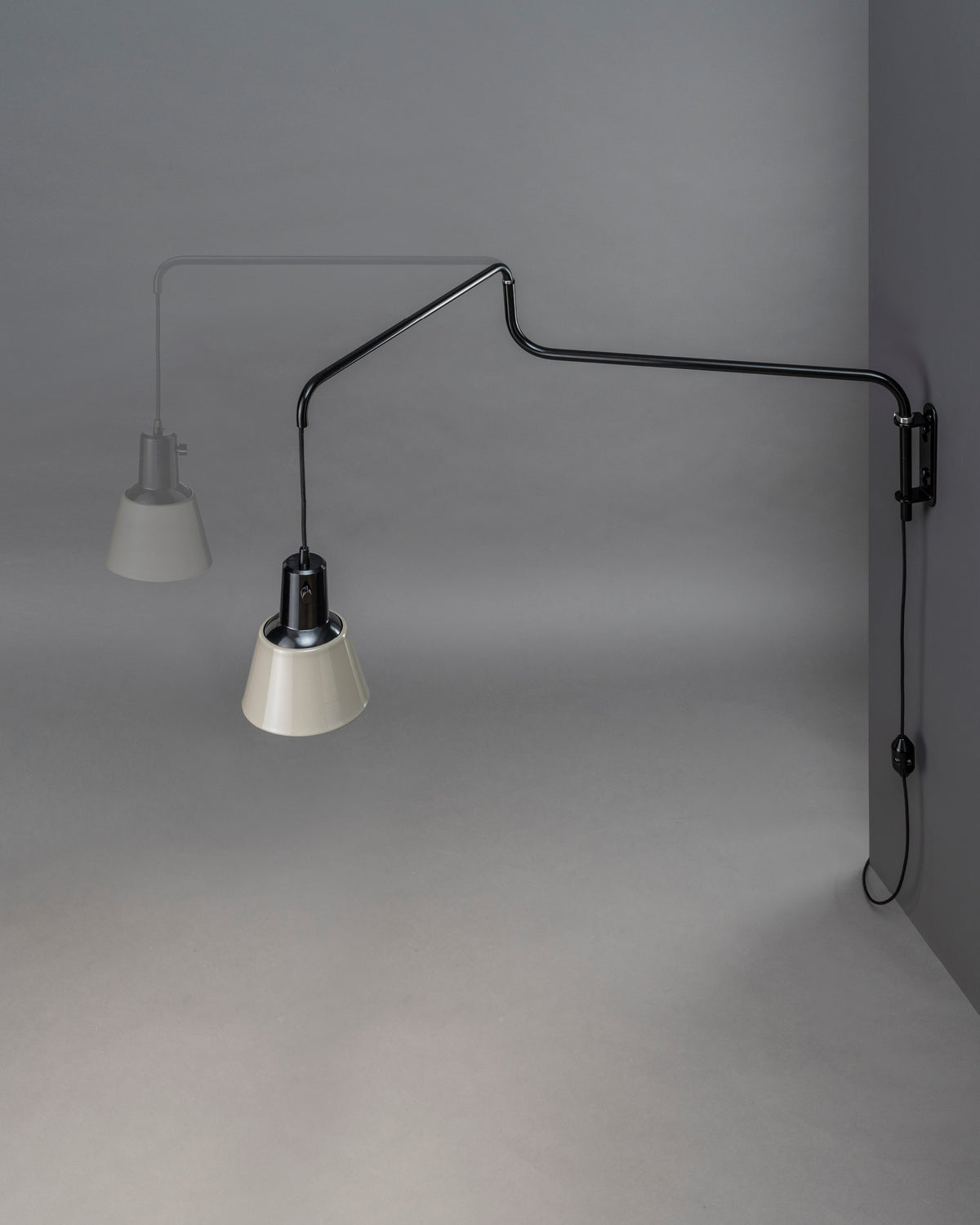 K830 wall by Midgard with rotating K831 double enamelled metal shade Bakelite dome and classic rotary switch