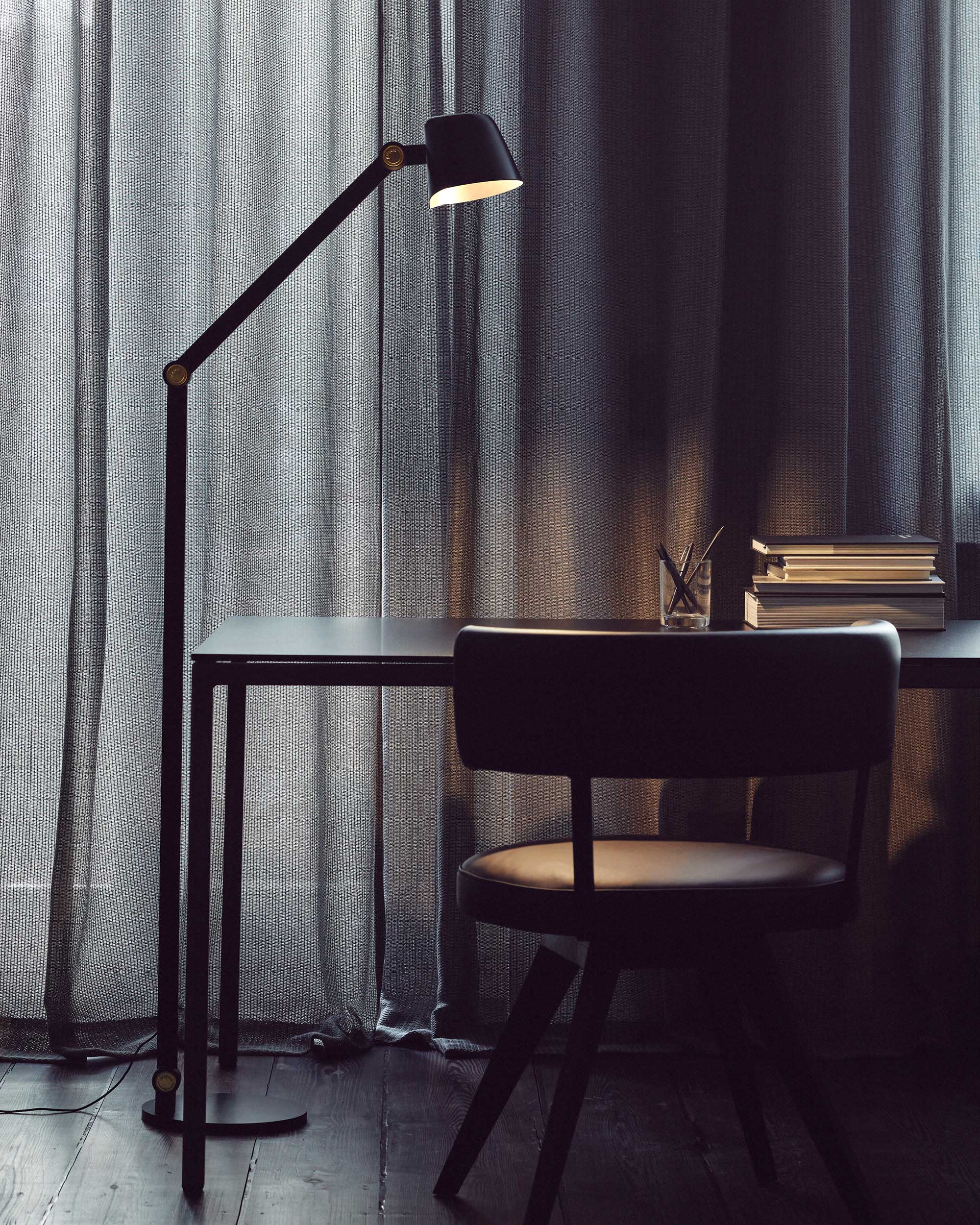 Midgard Modular NEO adjustable LED floor lamp in a contemporary interior