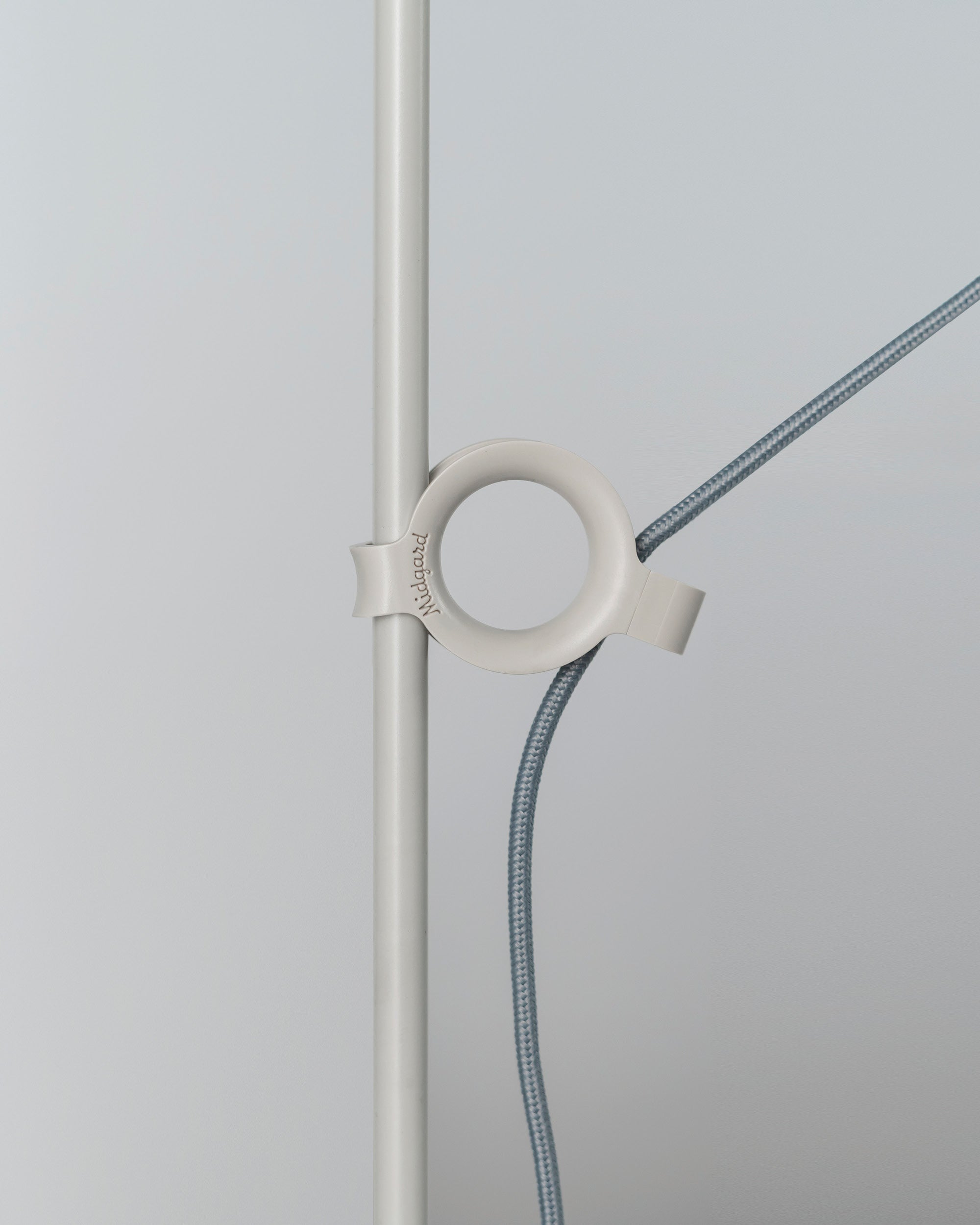 Patented adjustment ring of the Midgard AYNO S adjustable table lamp in silk grey