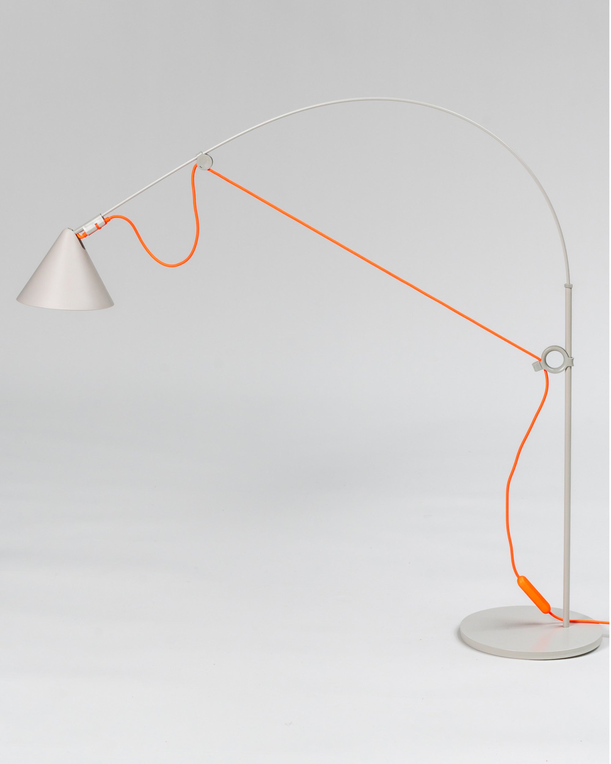 Midgard AYNO S adjustable table lamp in silk grey with neon orange textile cable in a modern interior