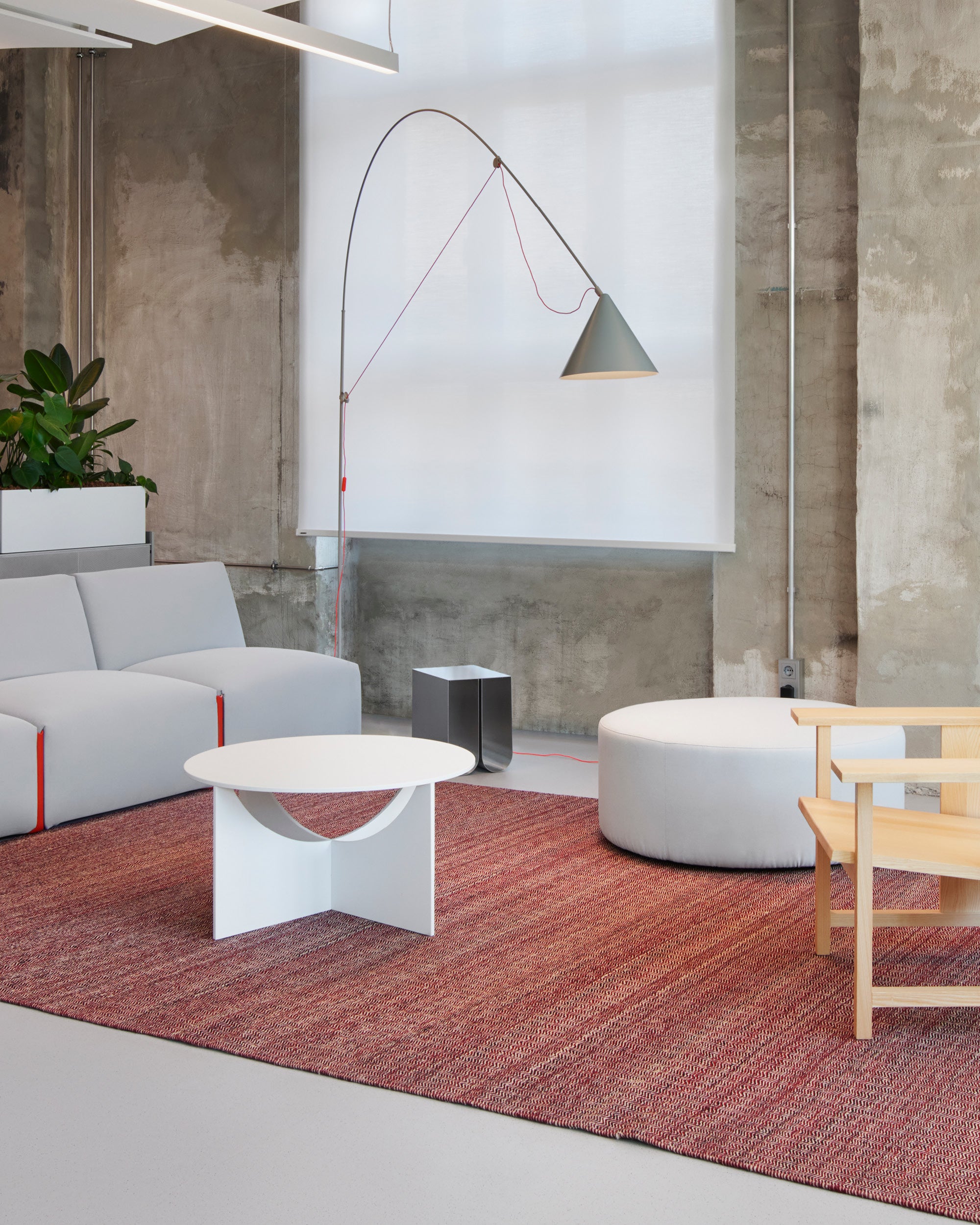 Midgard AYNO XL adjustable floor lamp in silk grey in a modern living room interior