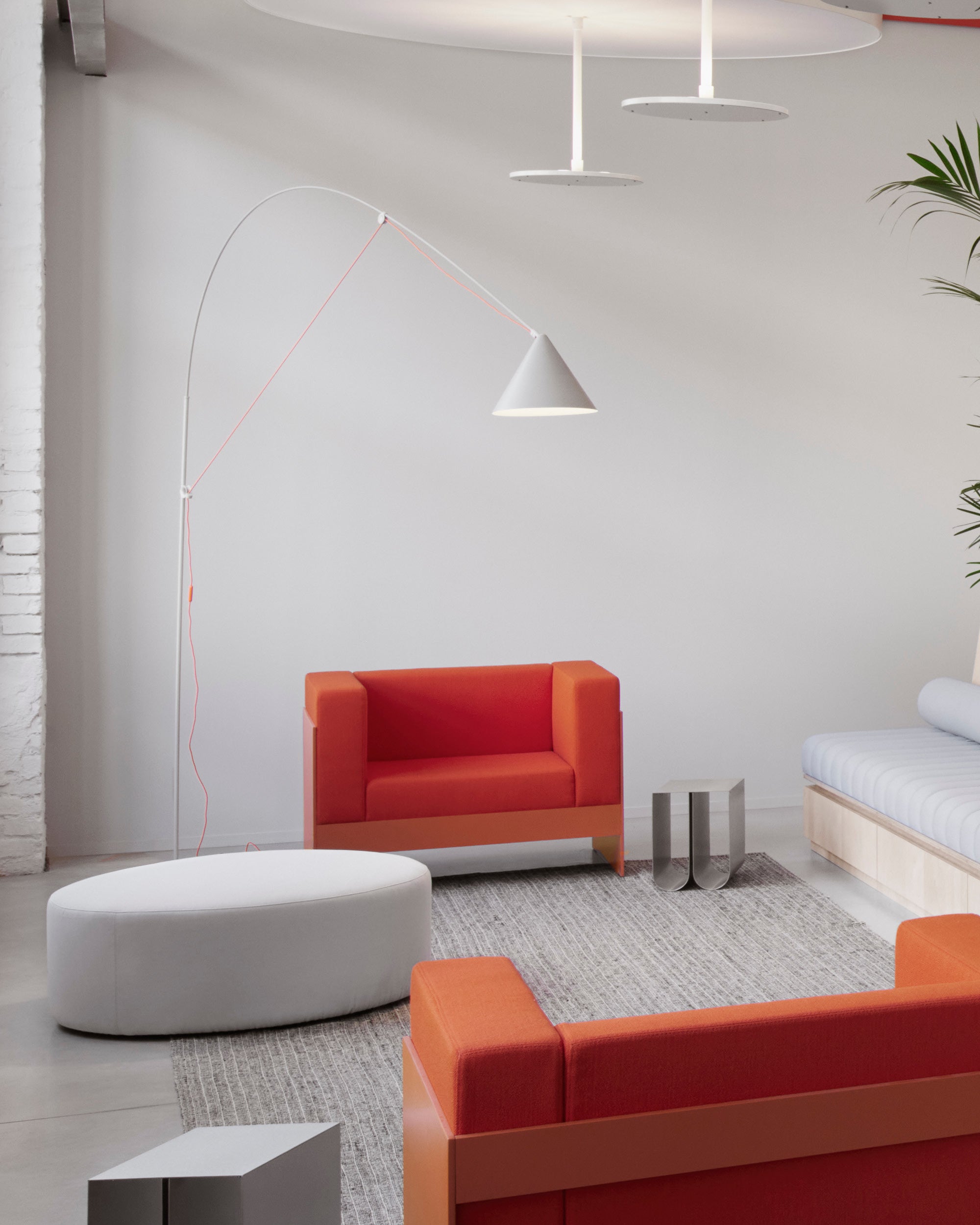 Midgard AYNO XL adjustable floor lamp in silk grey in a modern lounge interior