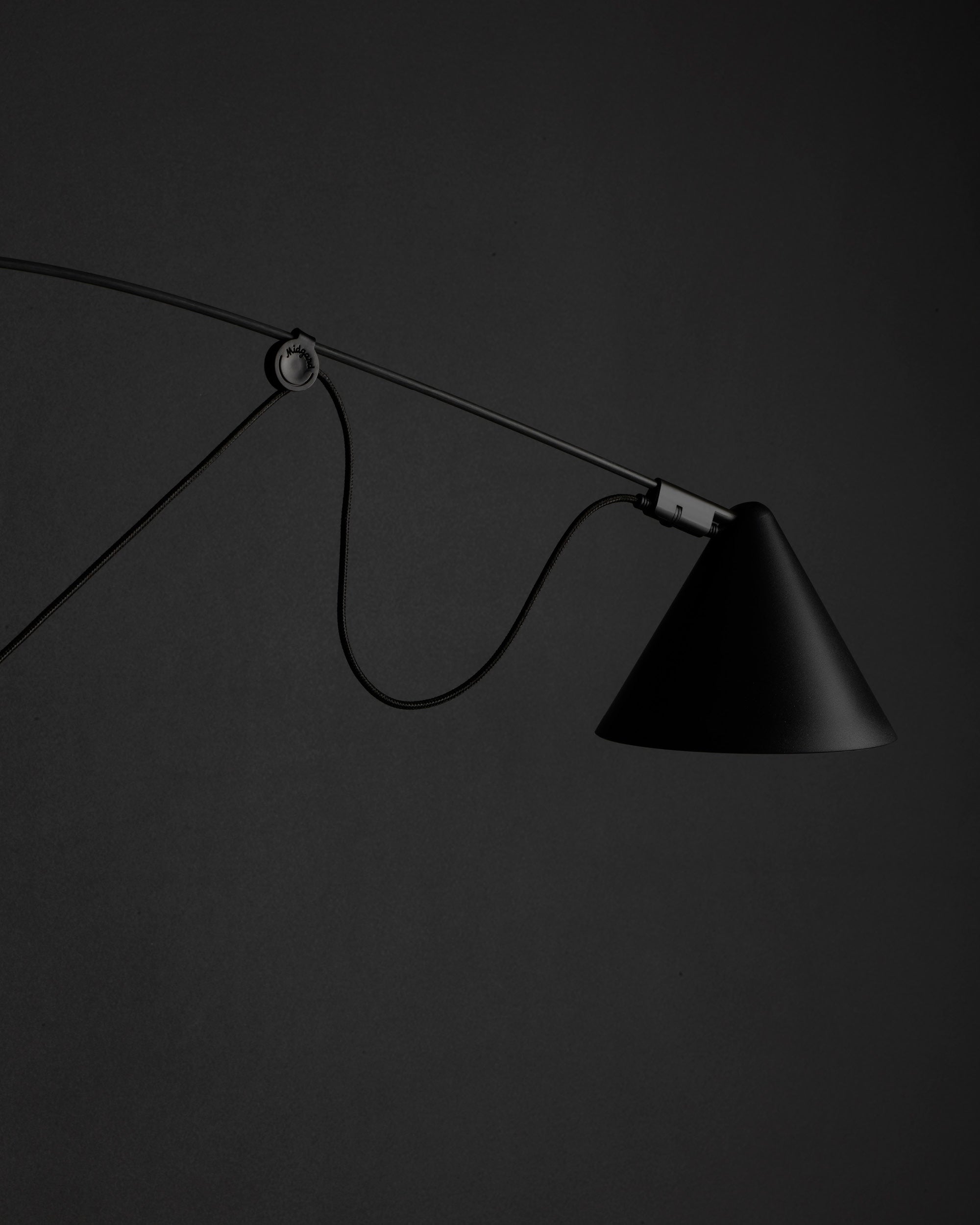Adjustable lampshade of the Midgard AYNO L wall lamp in black