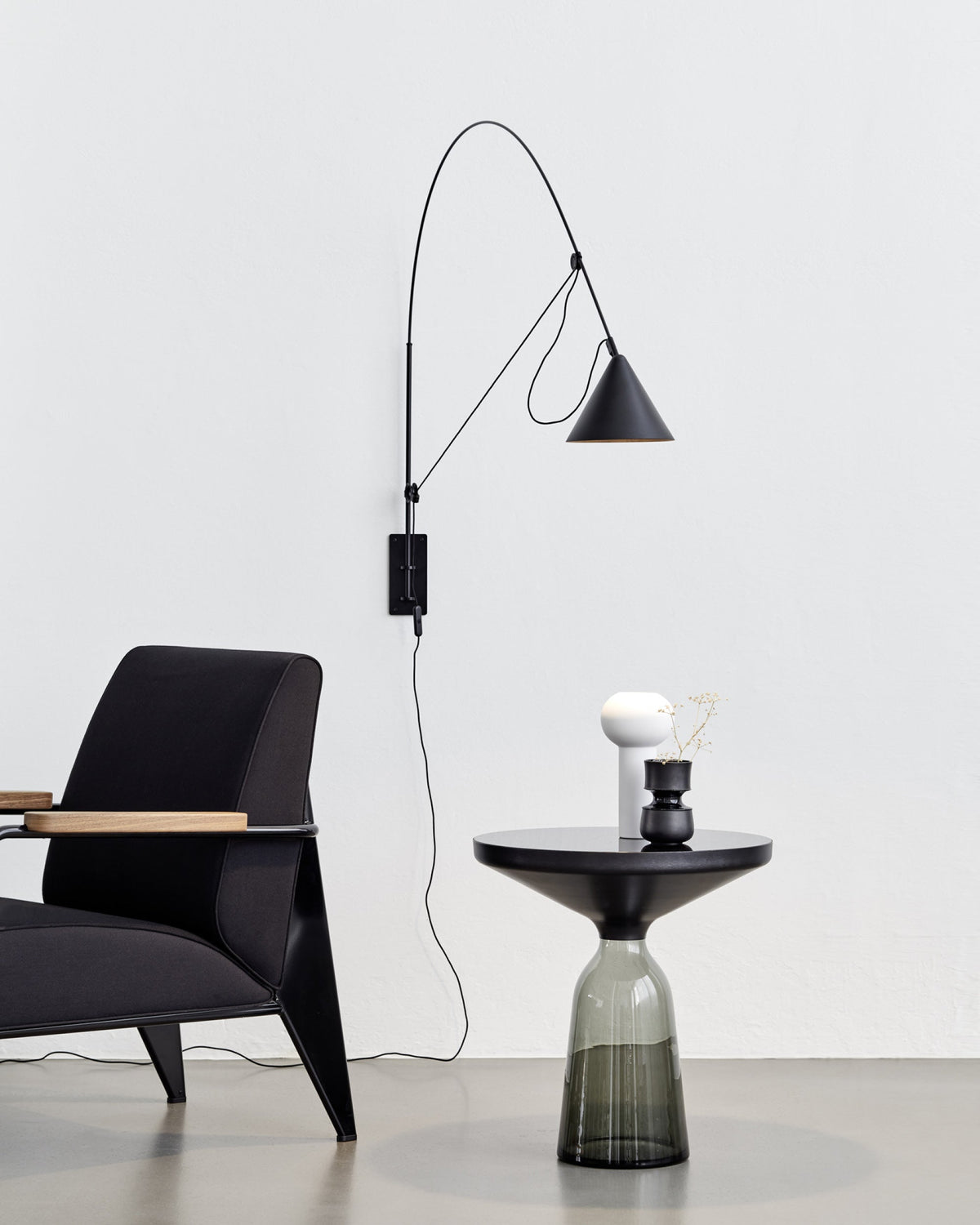 Midgard AYNO L adjustable wall lamp in black in a modern lounge interior