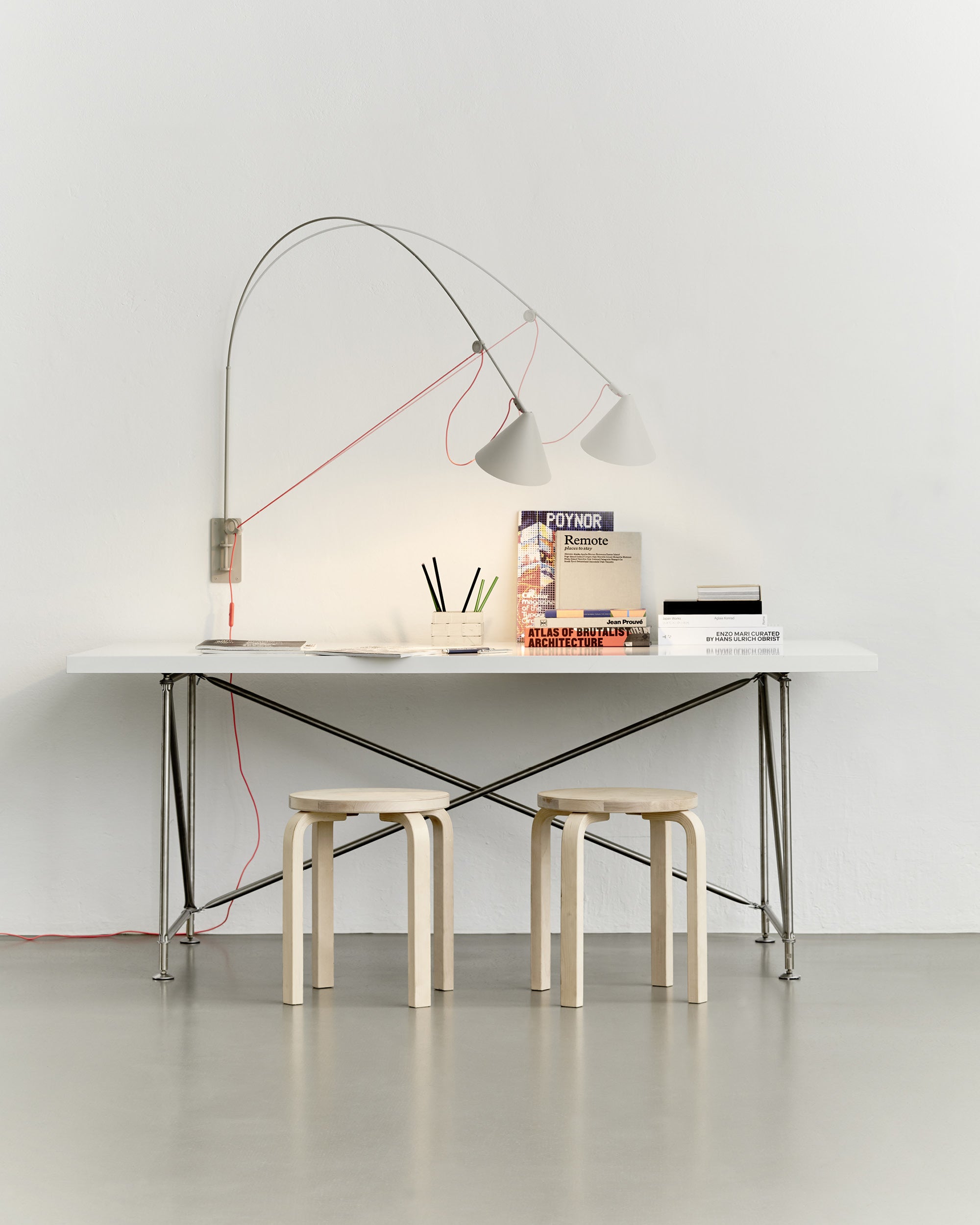 Midgard AYNO L adjustable wall lamp in silk grey in a modern dining interior