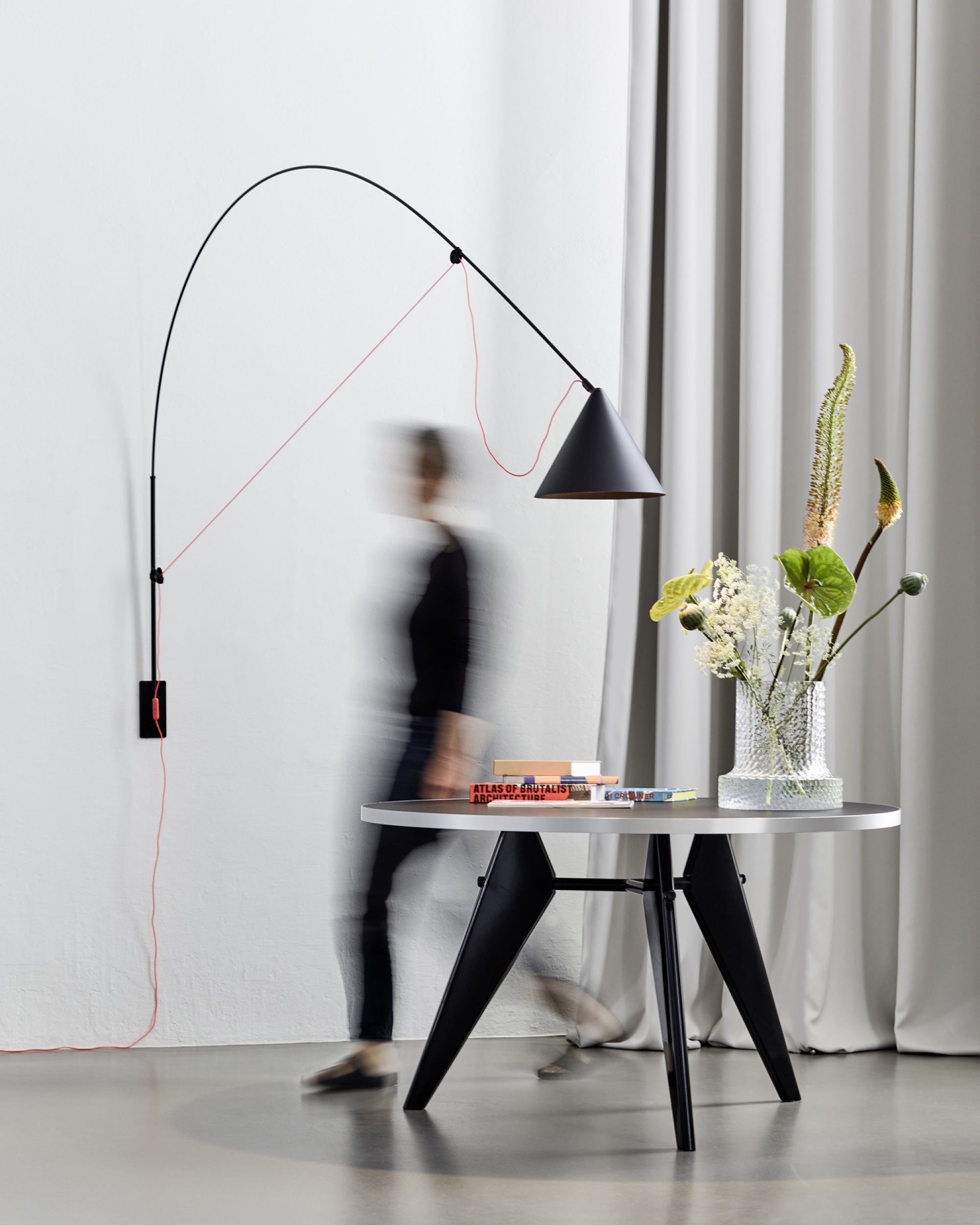 Midgard AYNO XL adjustable wall lamp in black in a modern interior