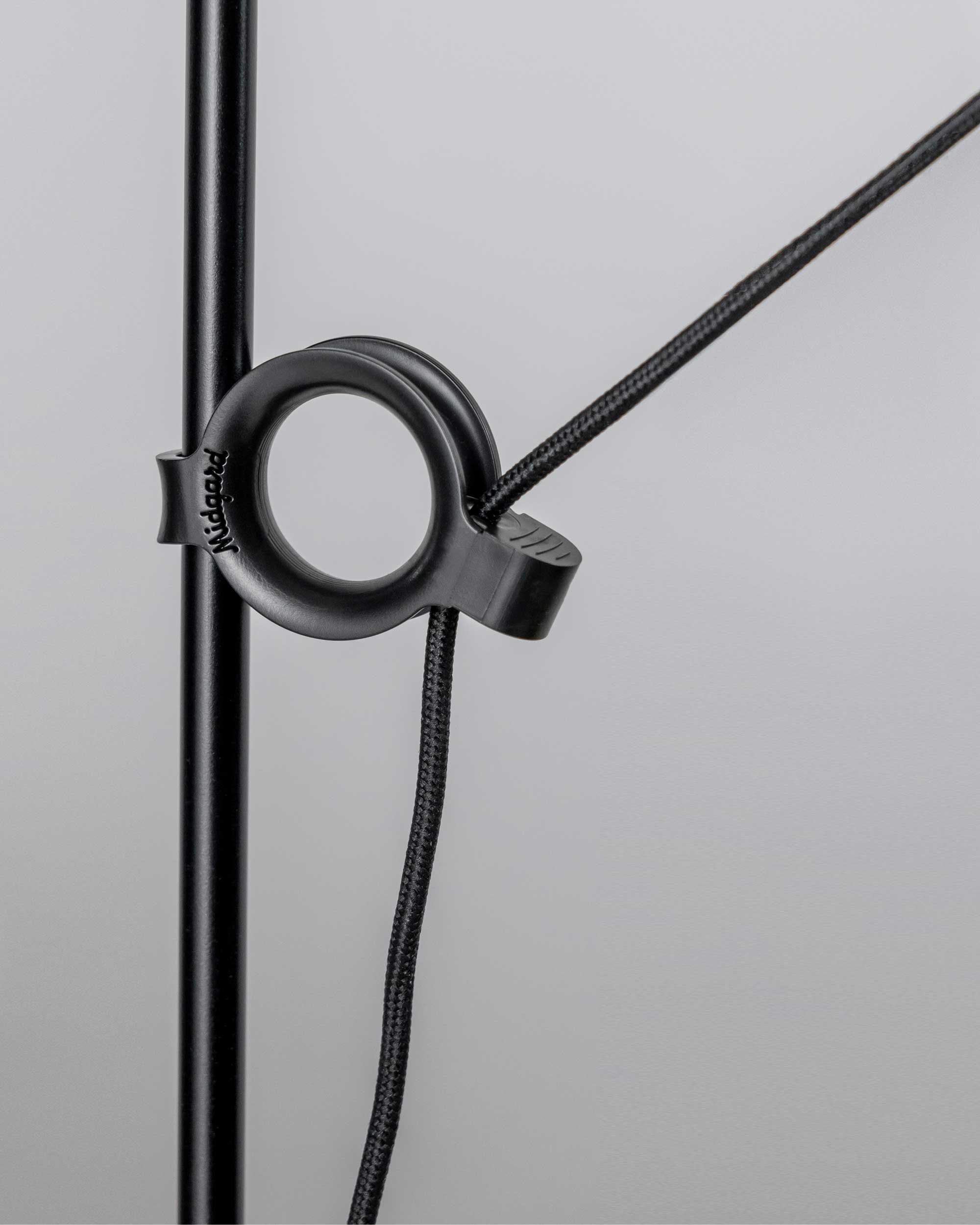 Close up of Adjustment ring and textile cable of the Midgard AYNO L floor lamp in black