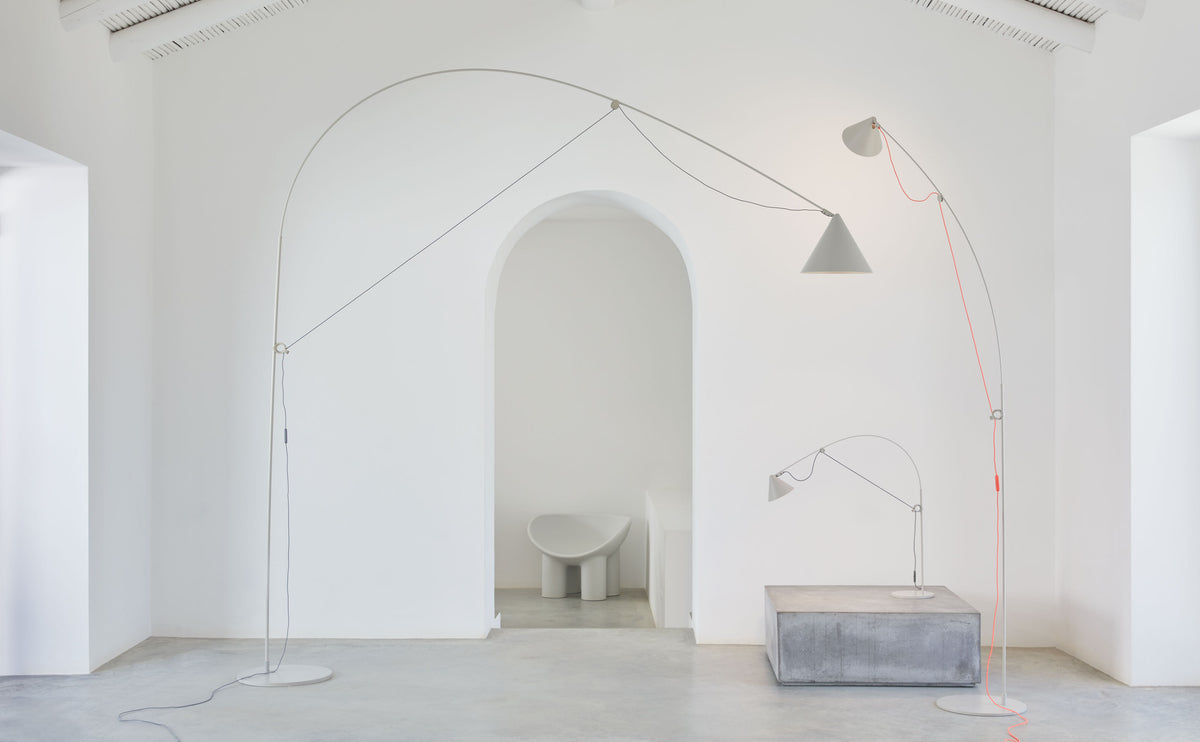AYNO adjustable lighting family designed by Stefan Diez for Midgard, featuring table, floor and wall lamps with the characteristic flexible fiberglass rod construction.
