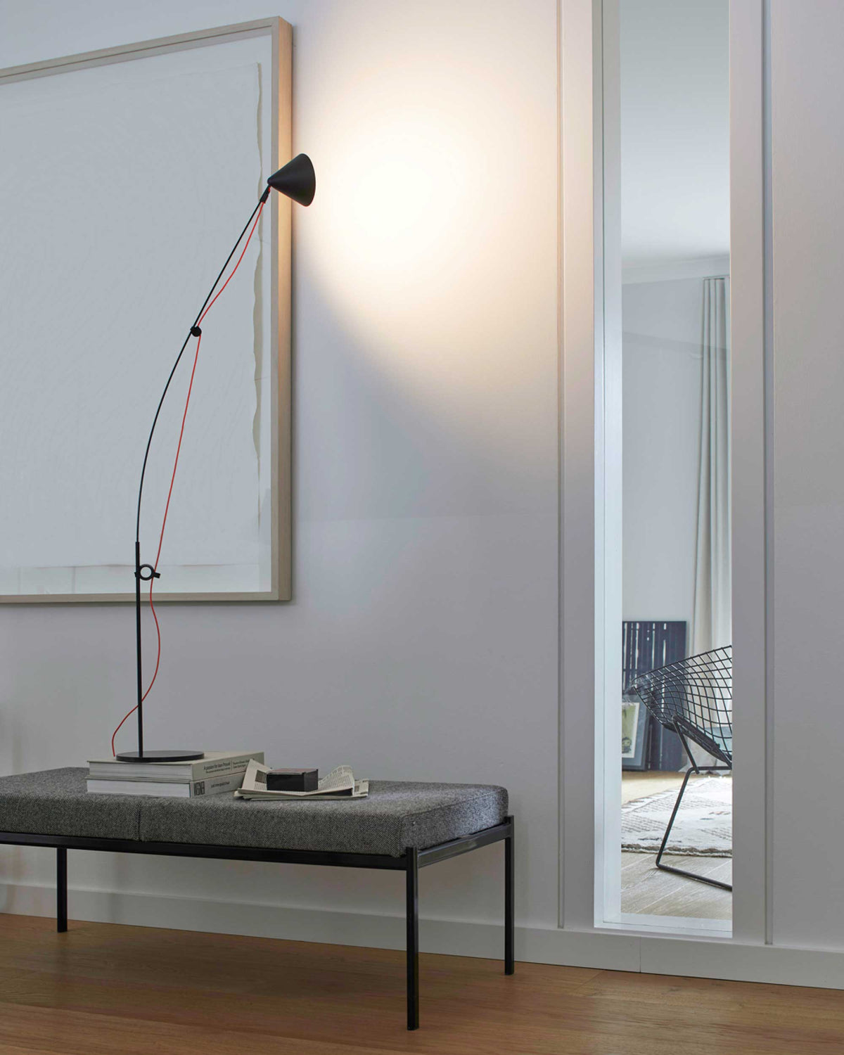 Midgard AYNO S table lamp upright as spot in black in an interior
