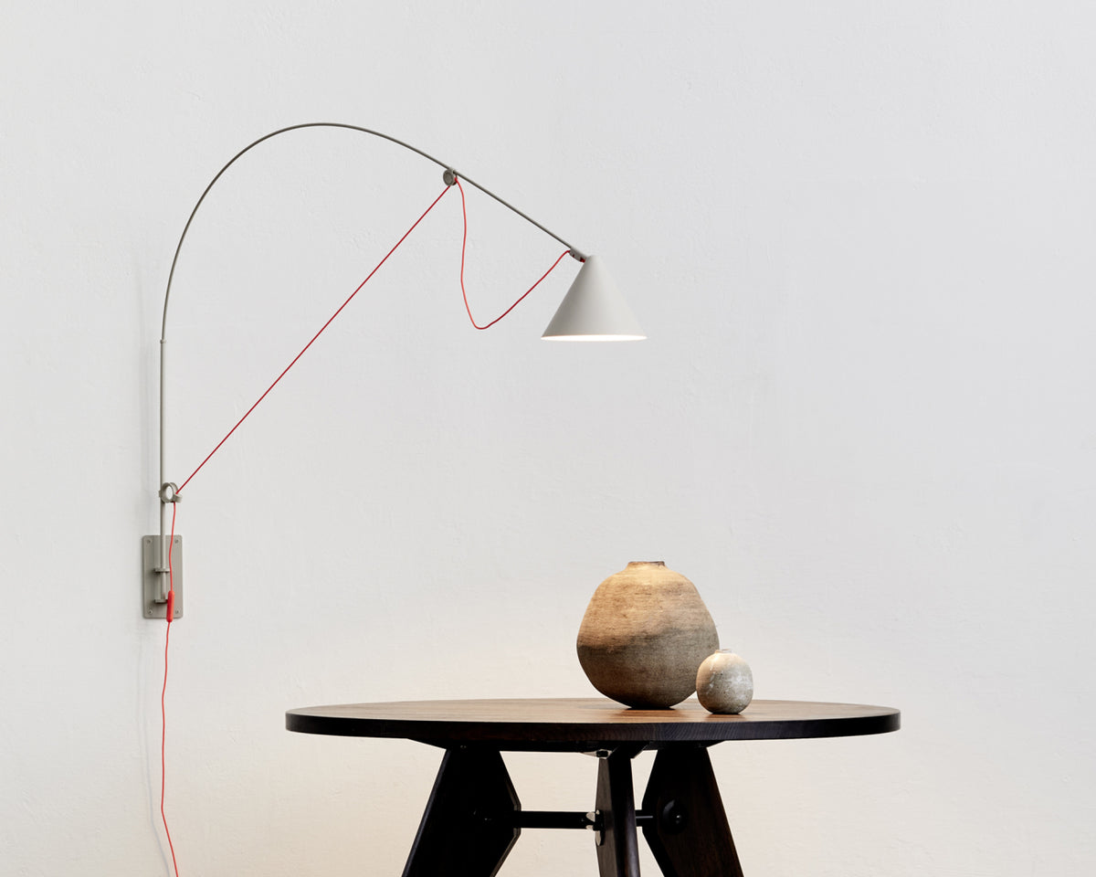 AYNO wall lamp by Stefan Diez for Midgard for swiveling wall-mounted lighting. Providing flexible outreach.
