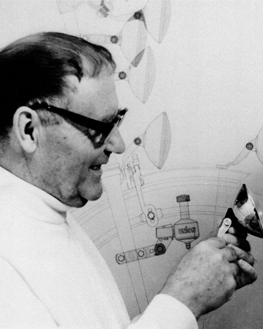 Portrait of German designer Werner Glasenapp, Bauhaus-era designer of the K830 wall lighting series produced by Midgard Licht