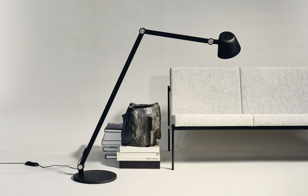 Midgard Modular NEO Bauhaus LED floor lamp with articulated arms and adjustable directional light in an interior setting