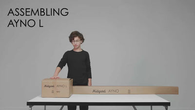 Step-by-step video instructions for assembling the AYNO L floor lamp by Stefan Diez for Midgard, including unpacking, assembly and setup.
